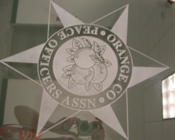Glass Signs for Peace Officers Standards and Training Commission